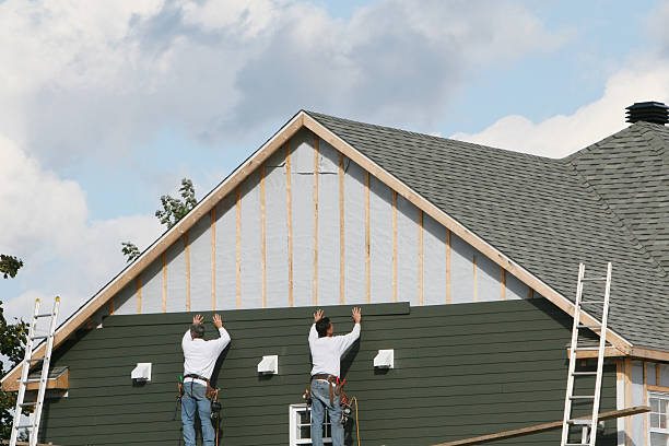Professional Siding technician working in Herminie, PA